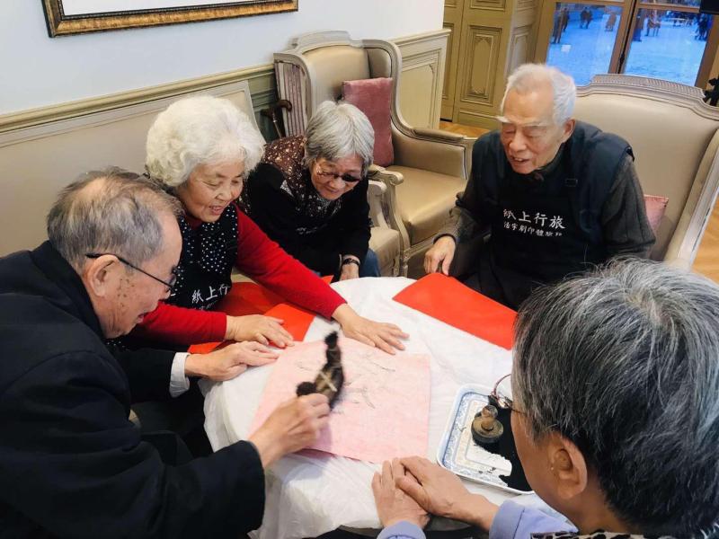Chinese New Year calligraphy with Orpea residents, image 4 of 4