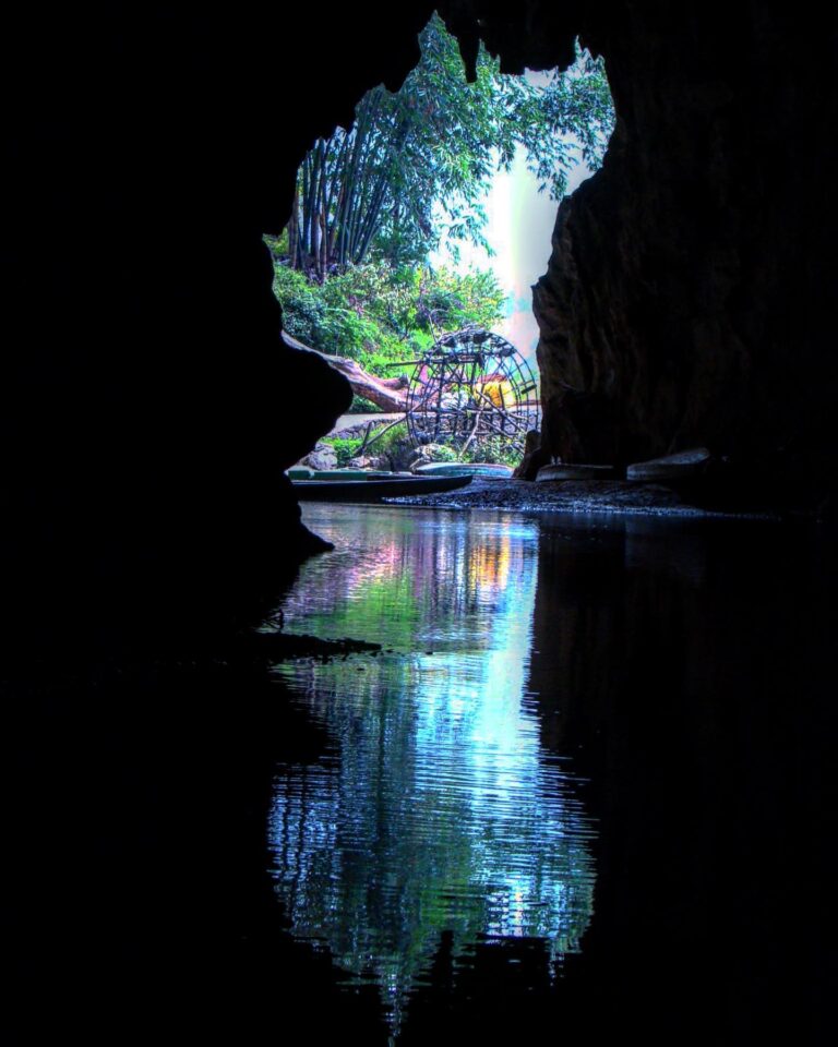 Beyond the cave, the water mill marking the entrance of Bamei, in Yunnan, southwest China, not far from the…