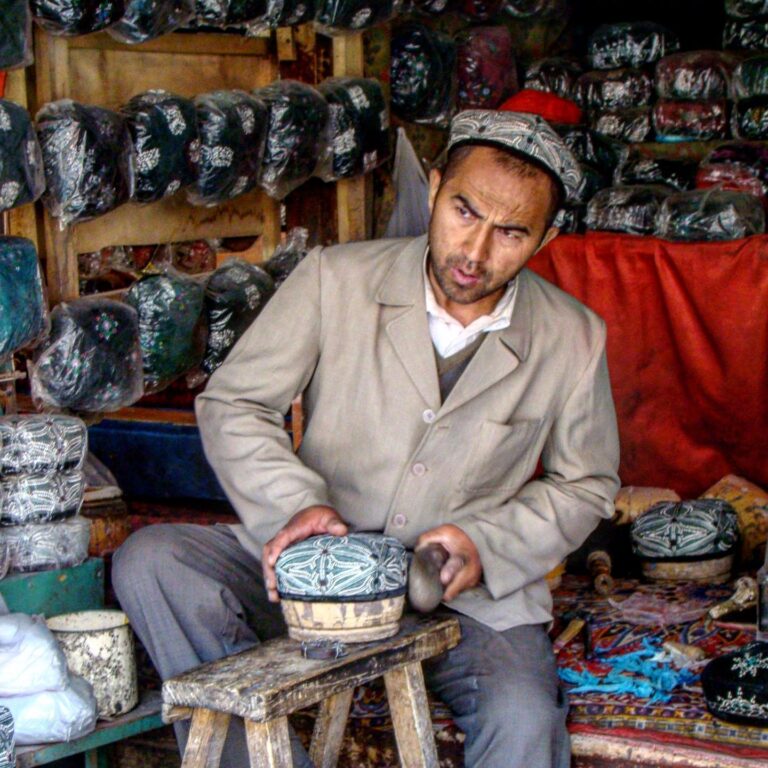 Hat-maker, bazaar of Kashgar, Chinese Turkestan (Xinjiang)