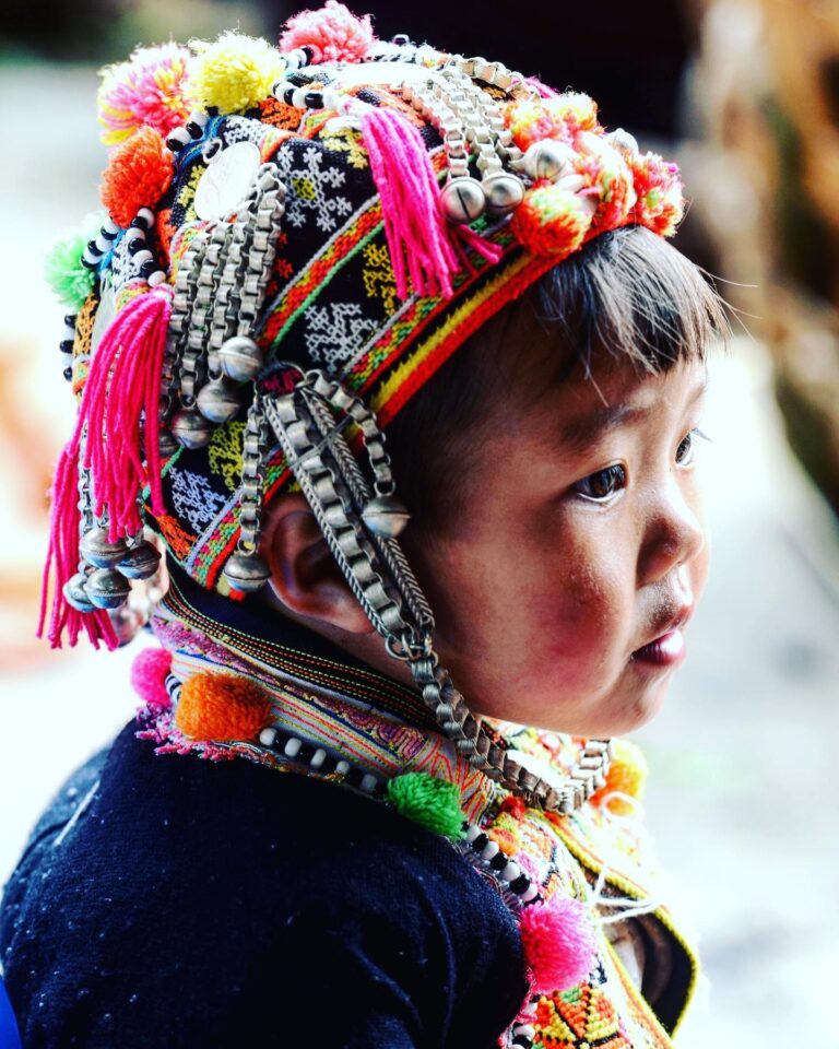Boy from the Yao ethnic minority, wearing a typical kid headgear from southwest China (Jinping, Honghe…