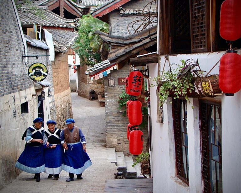 Naxi women gathering on Lijiang Old Town’s central square, image 1