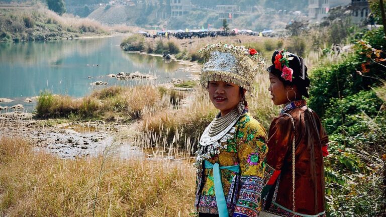 Young women from the Miao ethnic minority, an official category in China that includes groups known as Hmong…