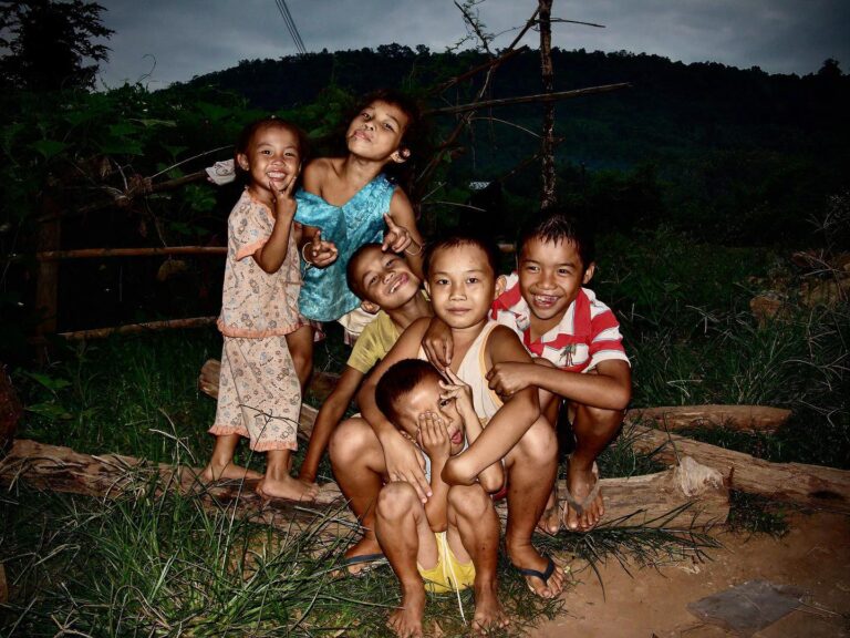 Lao kids from a village near Luang Prabang, having one good laugh before getting ready for bed