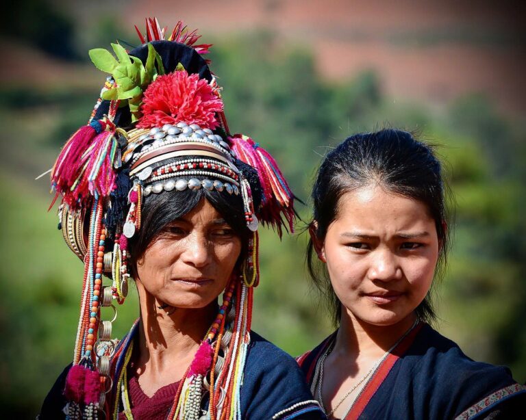 grandmother and grand-daughter from the Akha “sharp-headed” tribe, from Menglian, in Yunnan, bordering Myanmar
