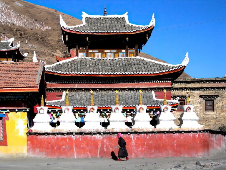 Tibetan believer going to the Temple, in Tagong, Sichuan