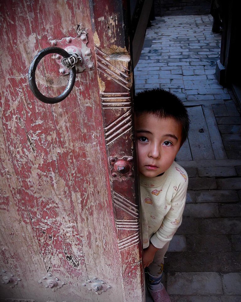 Little Uyghur girl from the streets of Kashgar Old Town