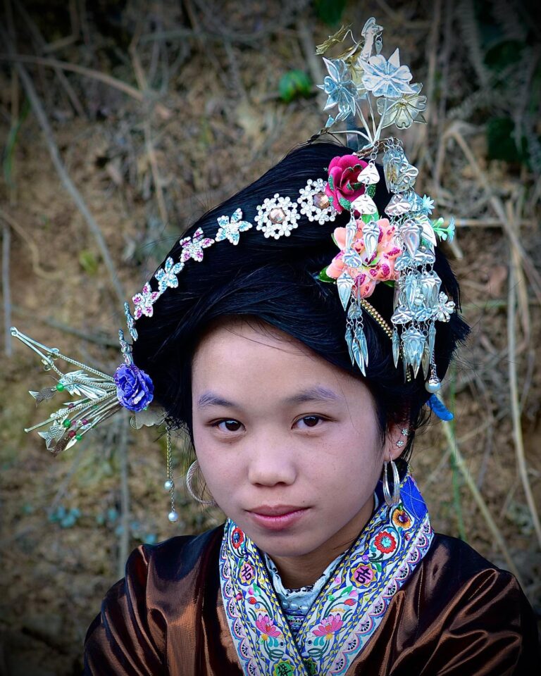 Miao young woman attending the yearly celebration of the Lusheng Festival