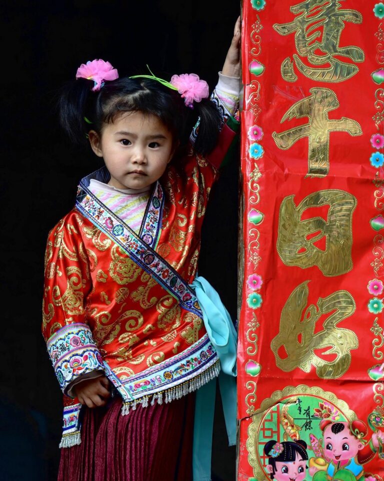 Happy New Year of the Tiger🏮🎊 🇨🇳 Miao young girl attending the yearly celebration of the Lusheng Festival,…