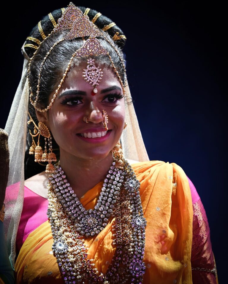 She was just there, at night, under the rain, in the middle of Little India, posing with a few other people…, image 1