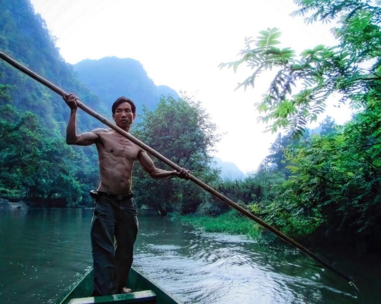 One of the ferrymen connecting Bamei to the rest of the World