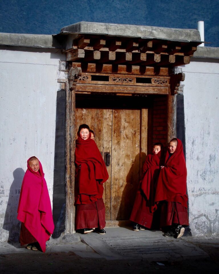 Young Tibetan Buddhist monks from the yellow-hat Gelugpa sect in Labrang, Gansu province, China
