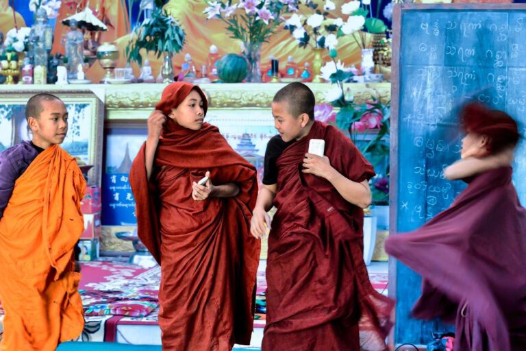 4 shades of monks… Young Dai Buddhist monks in Ruili, Yunnan, at the border between China and Myanmar