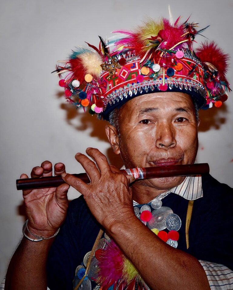 The talented flautist from the Akha “flat-headed” tribe, who played the music on the bamboo dance from the…