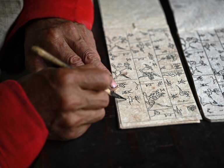 Copying the Naxi Dongba holy scriptures