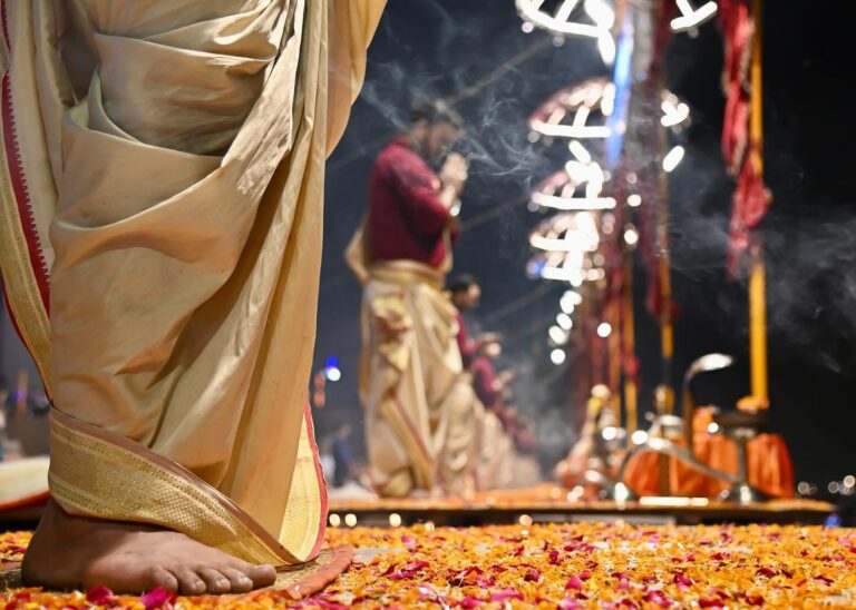 Pujaris (Priests) performing the Ganga Aarti ceremony in Varanasi, image 1