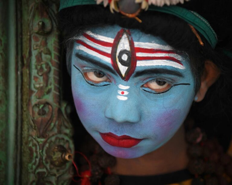Meet Sani, a 13-year-old boy from Varanasi, who, like many others, paints his face blue to represent Lord…