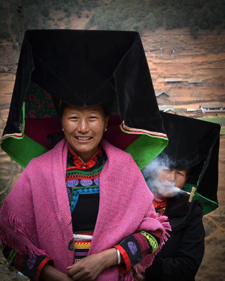 Women from the Black Yi ethnic group from Lijiang, near Lugu Lake at the border between the Yunnan and…