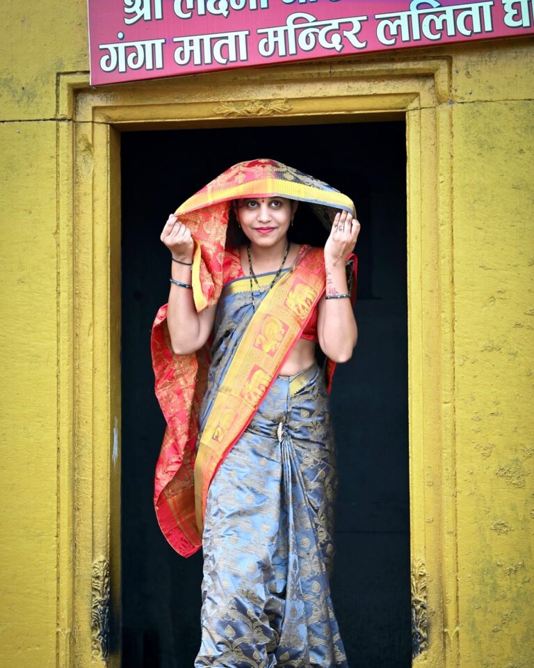 Pilgrim in Varanasi. The picture is unusually tall, and I wasn’t sure how to crop it, image 1