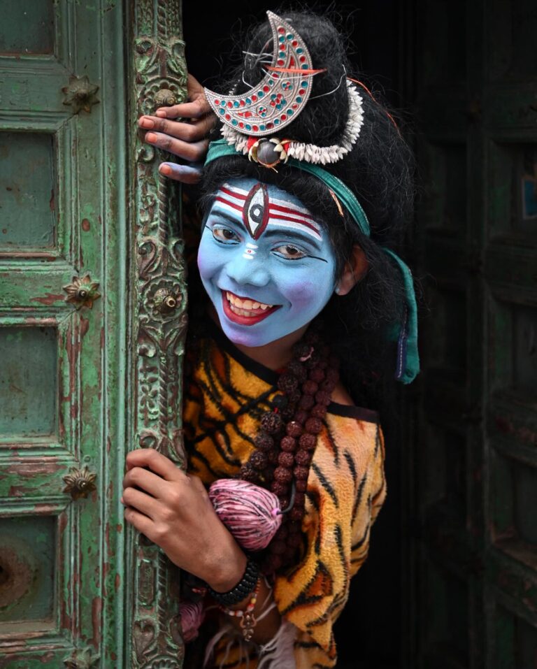 Meet Sani, a 13-year-old boy from Varanasi, who, like many others, paints his face blue to represent Lord…