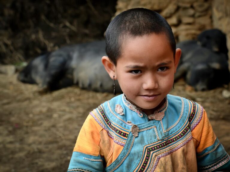Hani girl (and her pigs) from the Honghe prefecture, bordering Vietnam, one of my favourite places in Yunnan