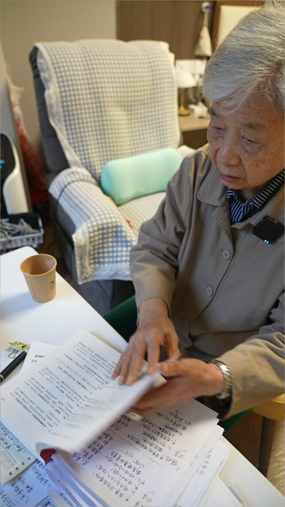 Mrs Ma at Sindora Nanjing working with printed and handwritten notes for her animated videos.